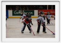 M playing ringette